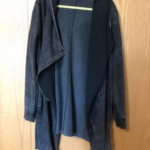 Drapey black zip up jacket.